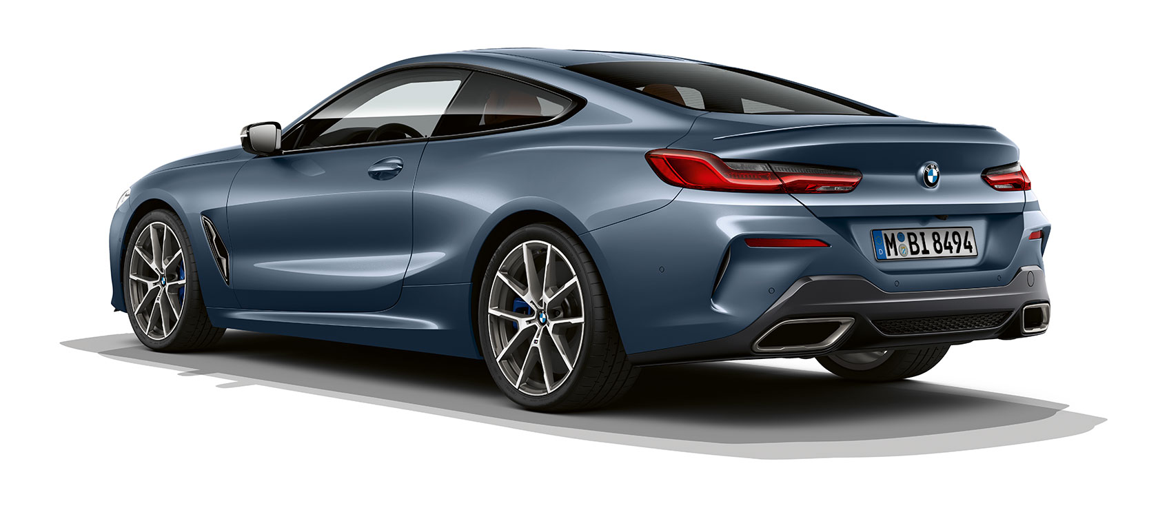 BMW 8er Coupé, Barcelona Blue metallic, three-quarter rear view.